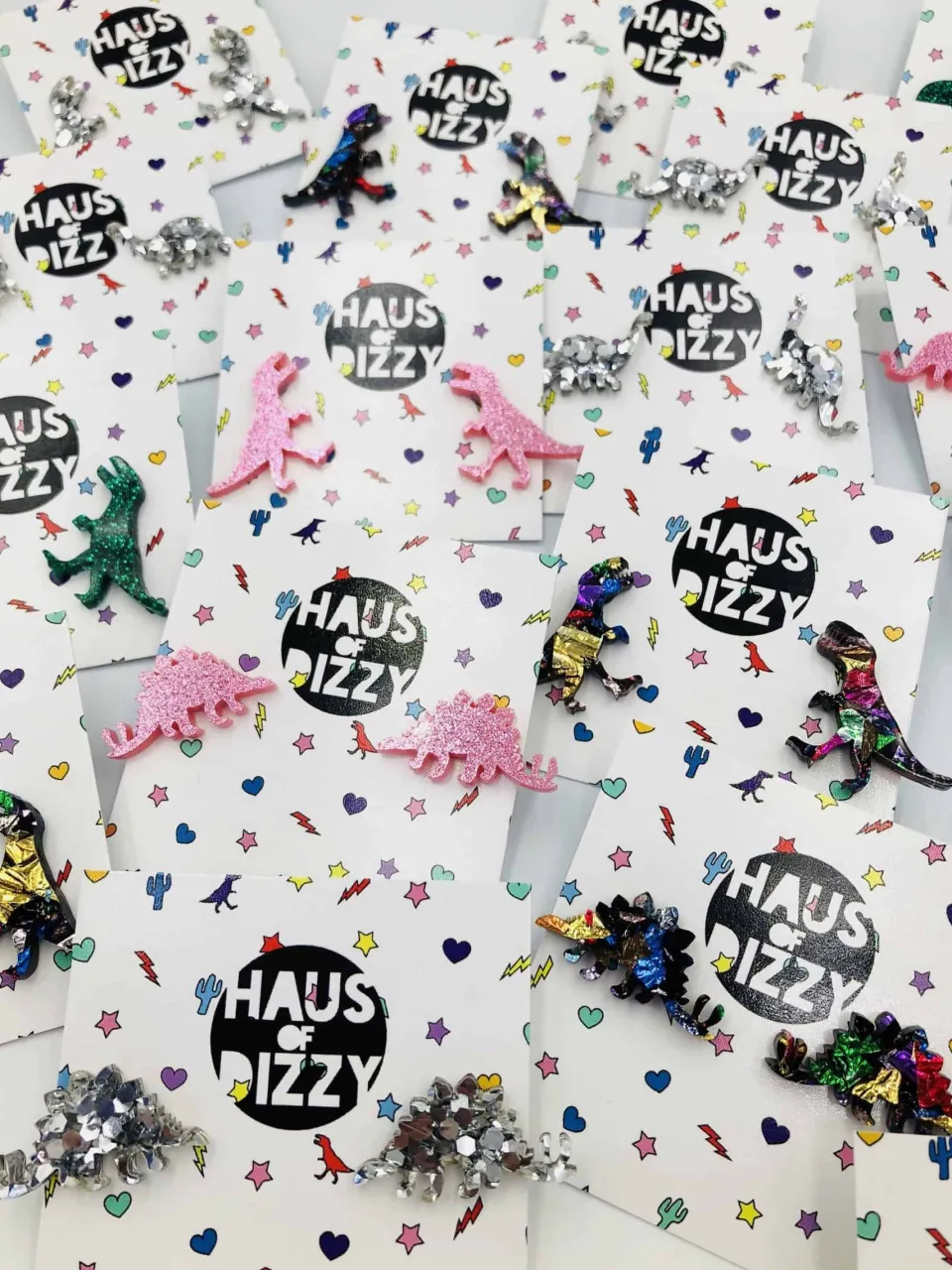haus_of_dizzy_glitter_din_1.webp Earrings^Haus Of Dizzy Glitter Dinosaur Studs